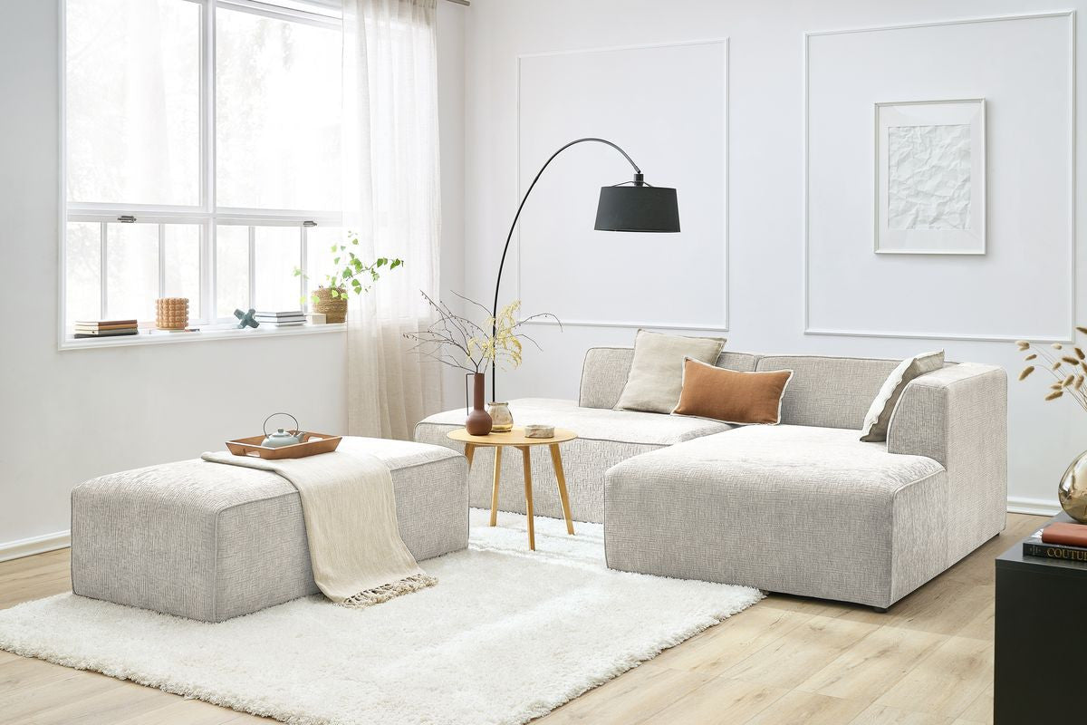 Canapé d'angle fixe modulable MEGEVE tissu texturé avec pouf