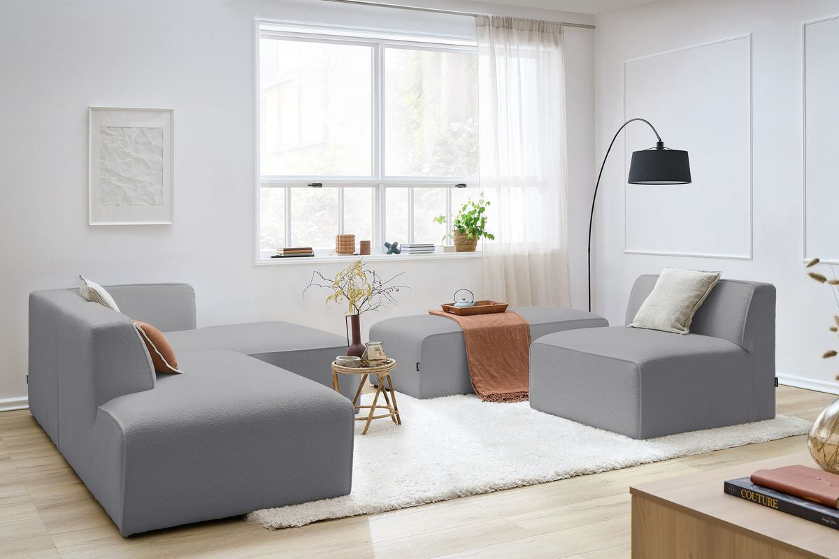 Canapé d'angle fixe modulable MEGEVE tissu bouclette avec 1 chauffeuse et 1 pouf