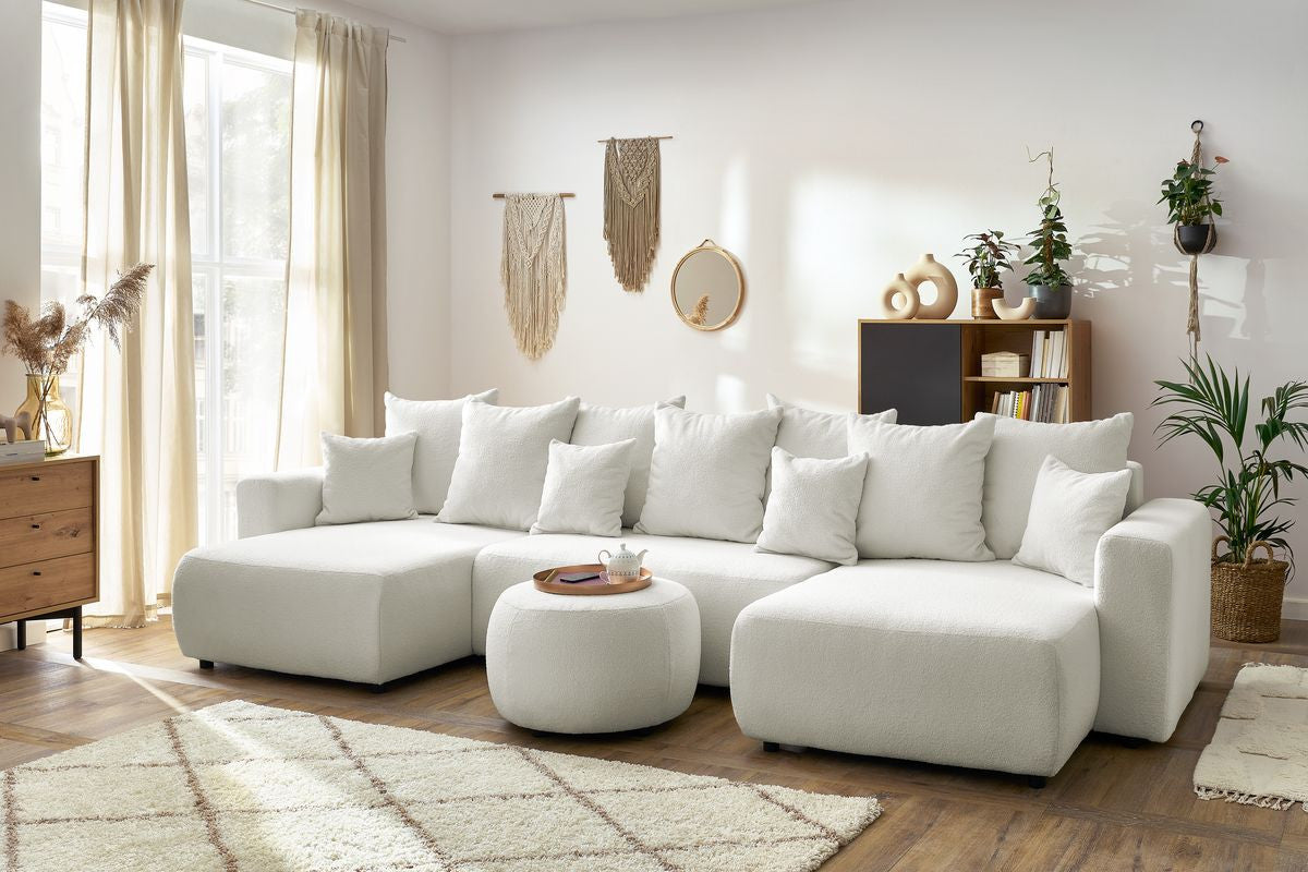Canapé panoramique convertible coffre ENVY tissu bouclette avec pouf rond