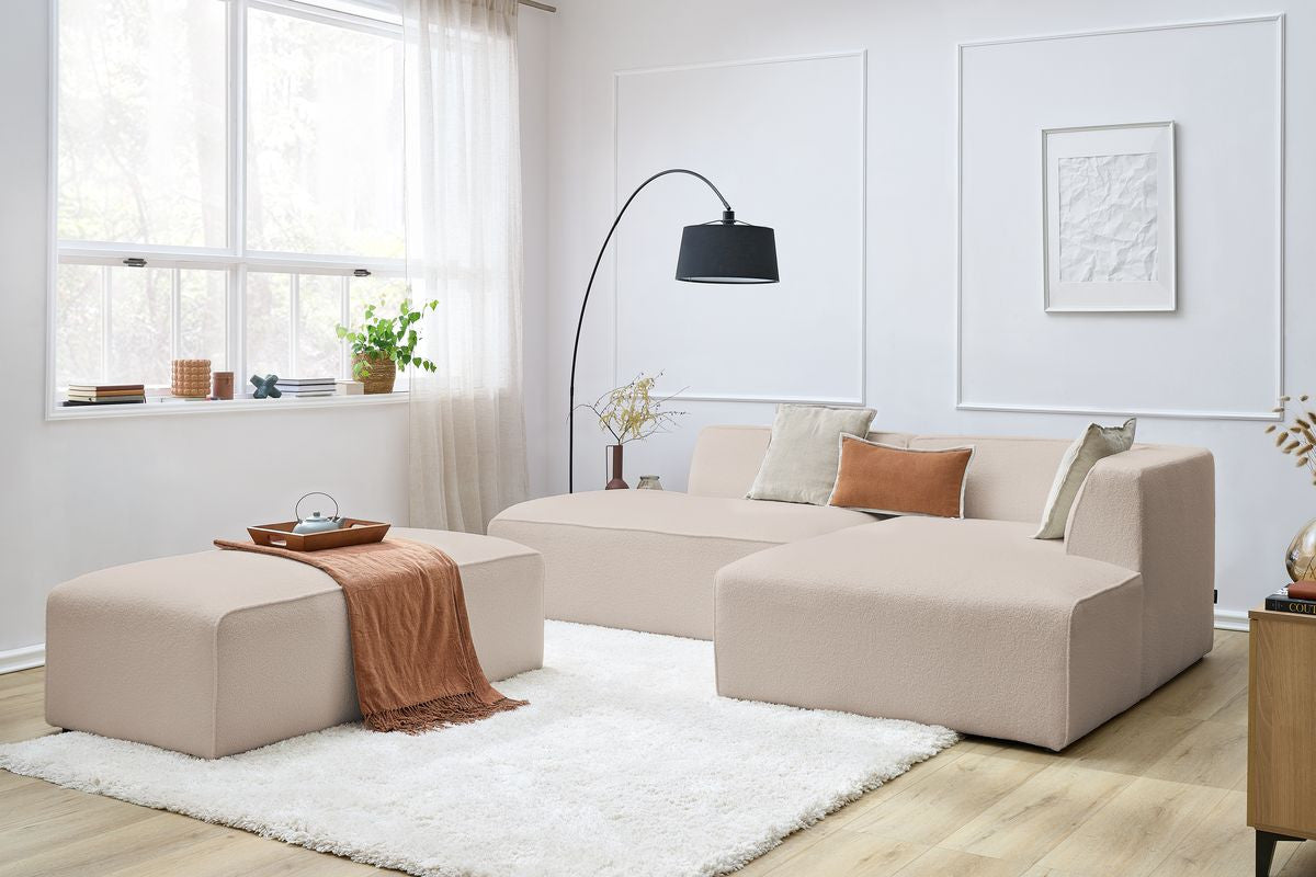 Canapé d'angle fixe modulable MEGEVE tissu bouclette avec pouf