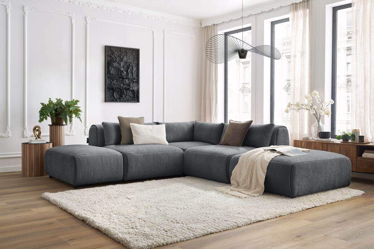 Canapé d'angle fixe modulable JEANNE tissu texturé avec 2 chauffeuses, 1 angle et 2 poufs