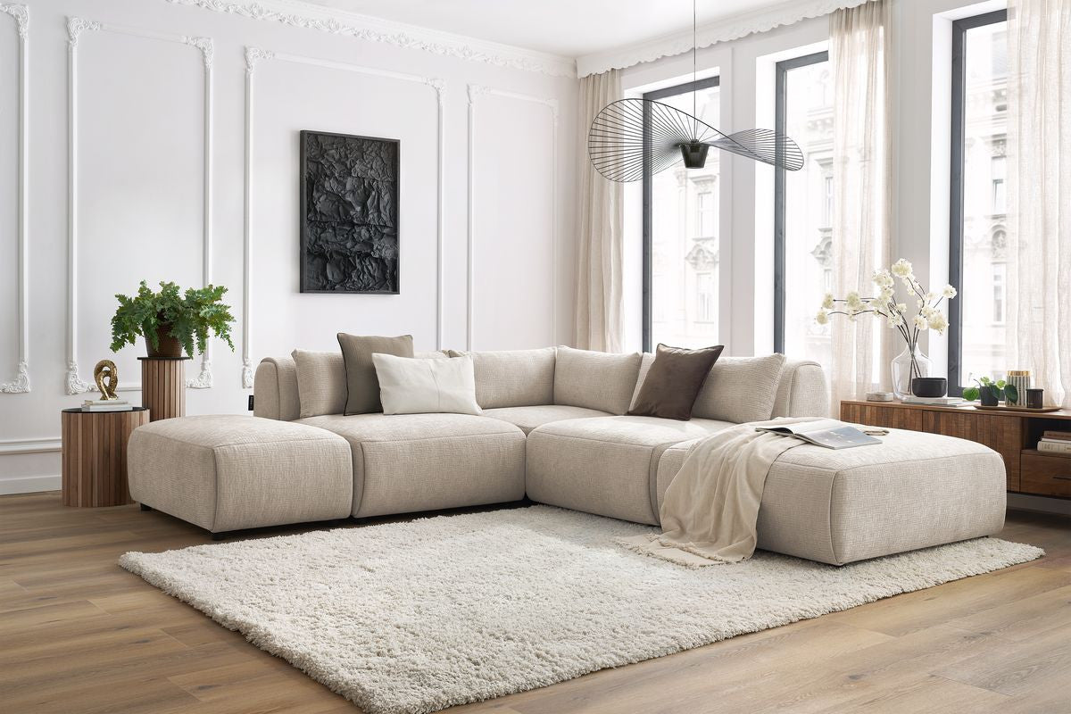 Canapé d'angle fixe modulable JEANNE tissu texturé avec 2 chauffeuses, 1 angle et 2 poufs