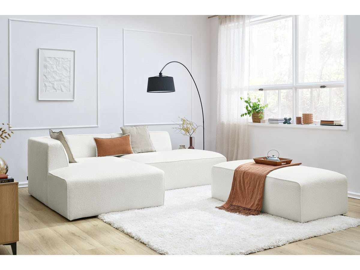 Canapé d'angle fixe modulable MEGEVE tissu bouclette avec pouf